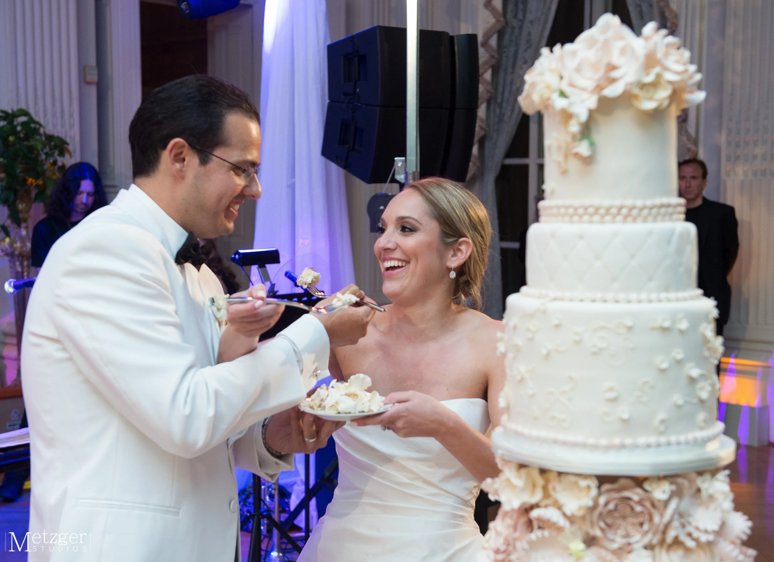 Opulent towering champagne wedding cake in Newport, Rhode Island